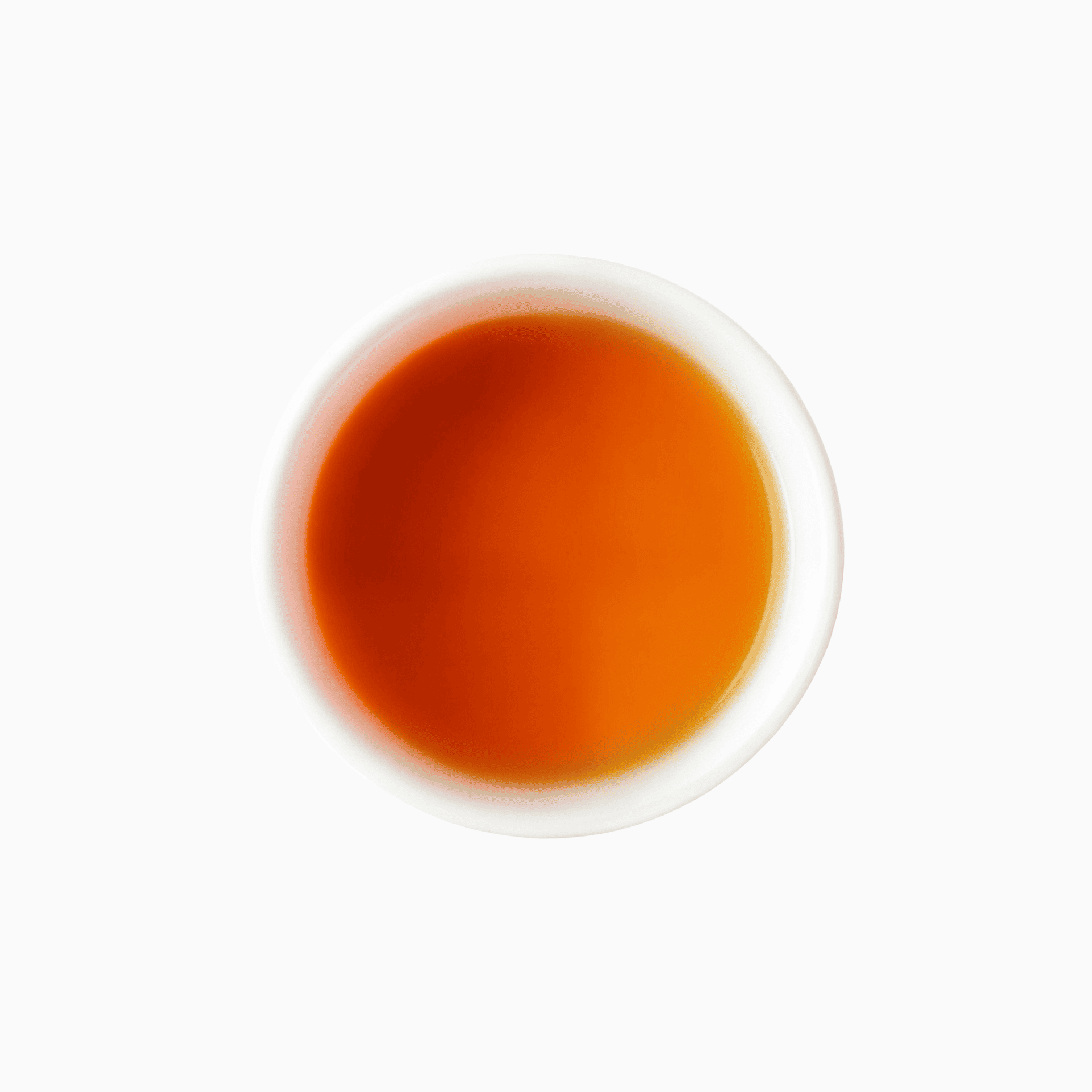 有機紅茶を淹れた水色(明るい紅色のカップ) / Brewed cup of organic Japanese black tea from Kirishima, Kagoshima - 今村茶園